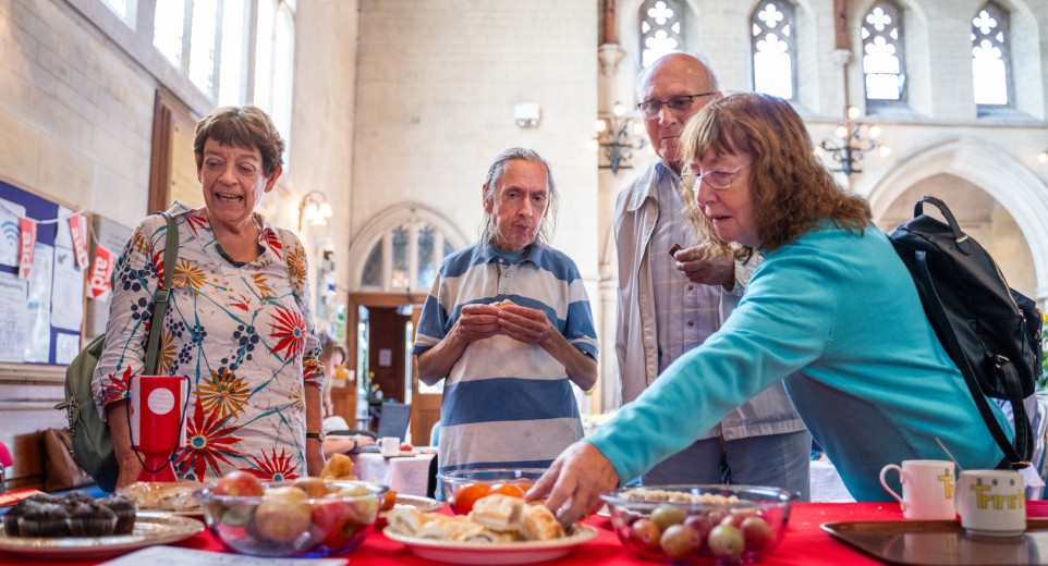 Supporters at a Christian Aid Week bake sale 
