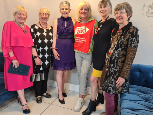 Women enjoying pre-loved fasion show, Belfast