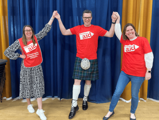 Joining hands at a ceillidh in Bangor