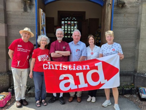 Christian Aid supporters outside church book sale