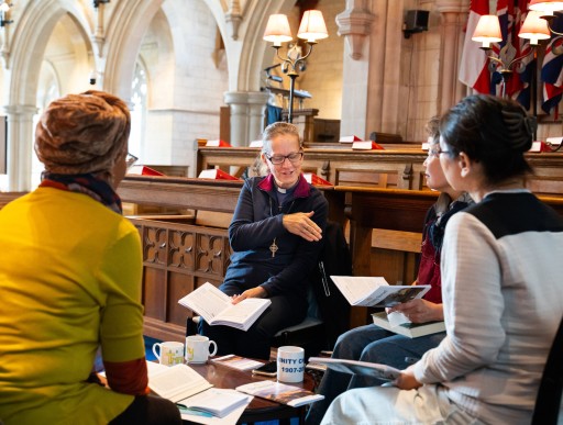 Small group having a conversation in a church