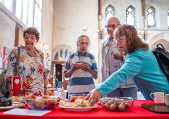 Supporters at a Christian Aid Week bake sale 